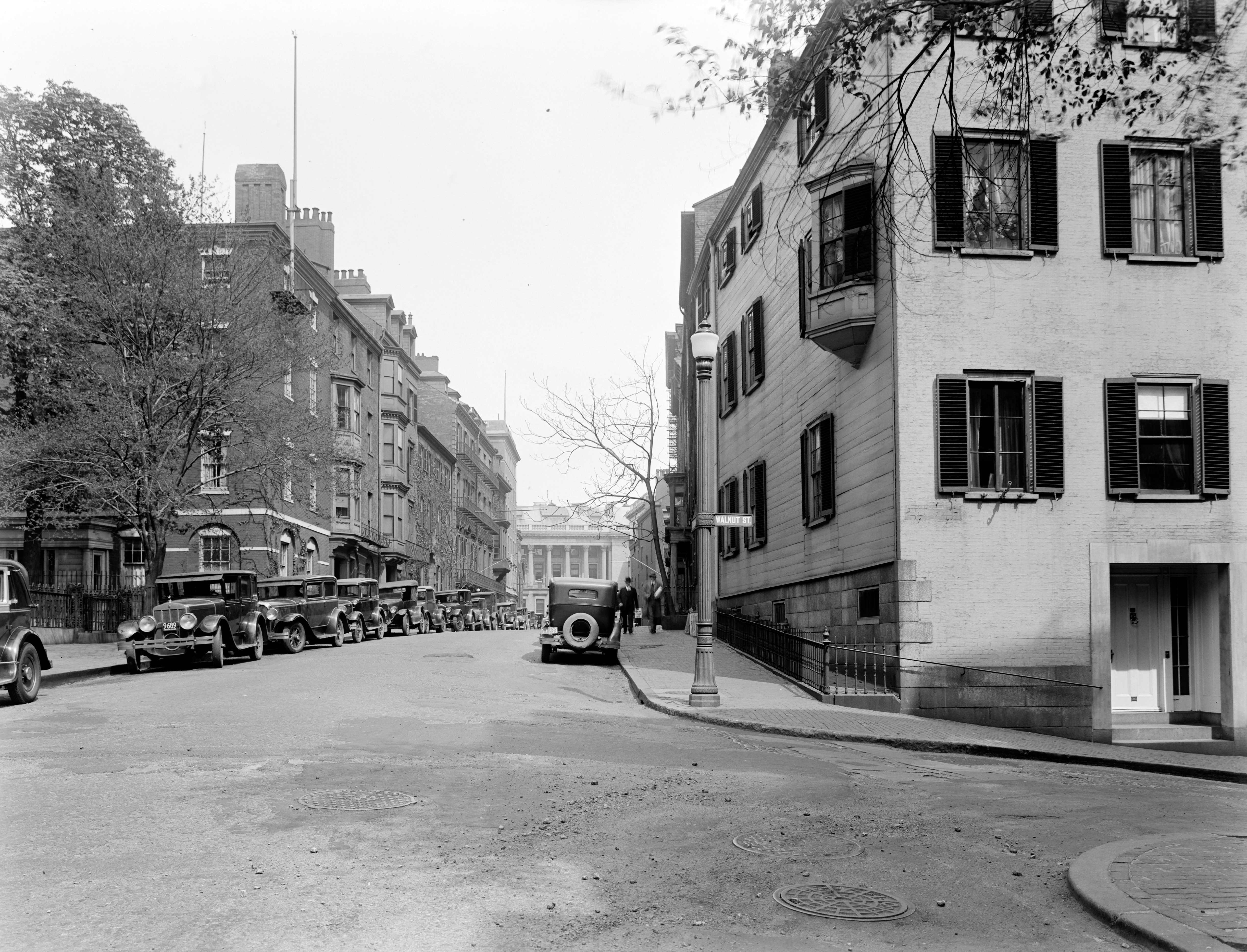 grayscale photo of city buildings