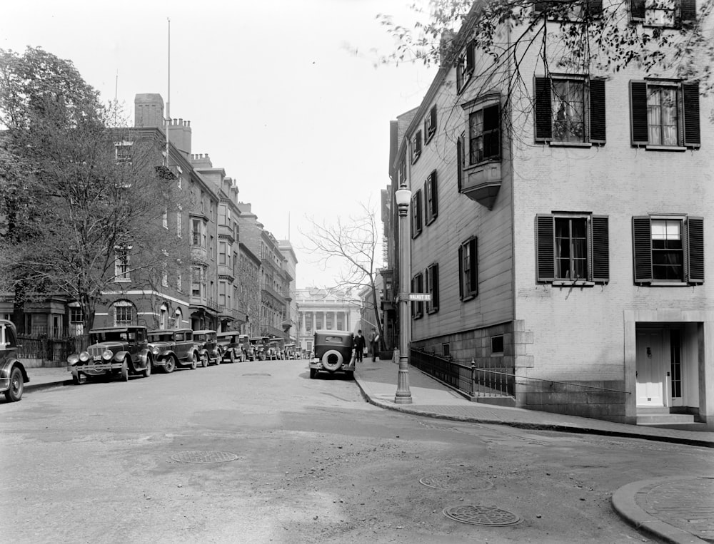 grayscale photo of city buildings