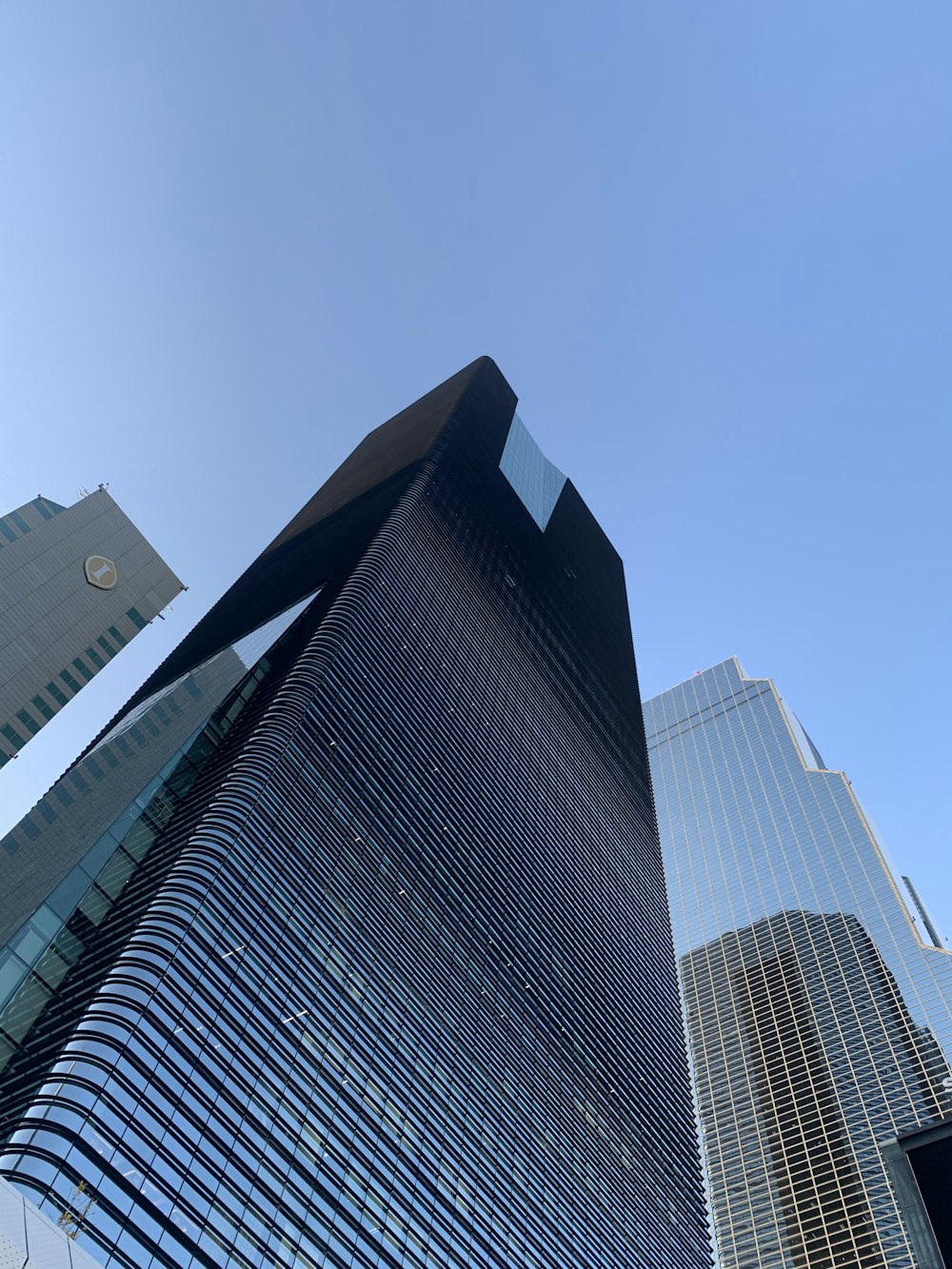 low angle photography of high rise buildings