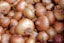 white garlic on brown wooden table