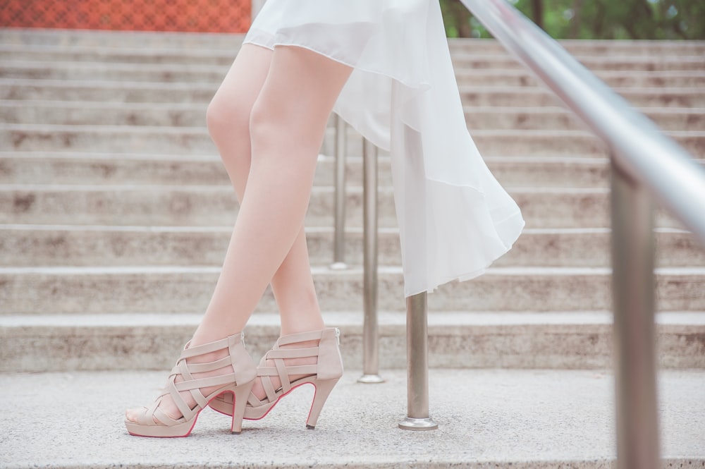 woman in white dress and pink peep toe sandals