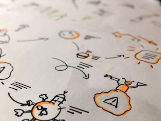 white and yellow cat print textile