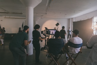 people sitting on chairs in front of table