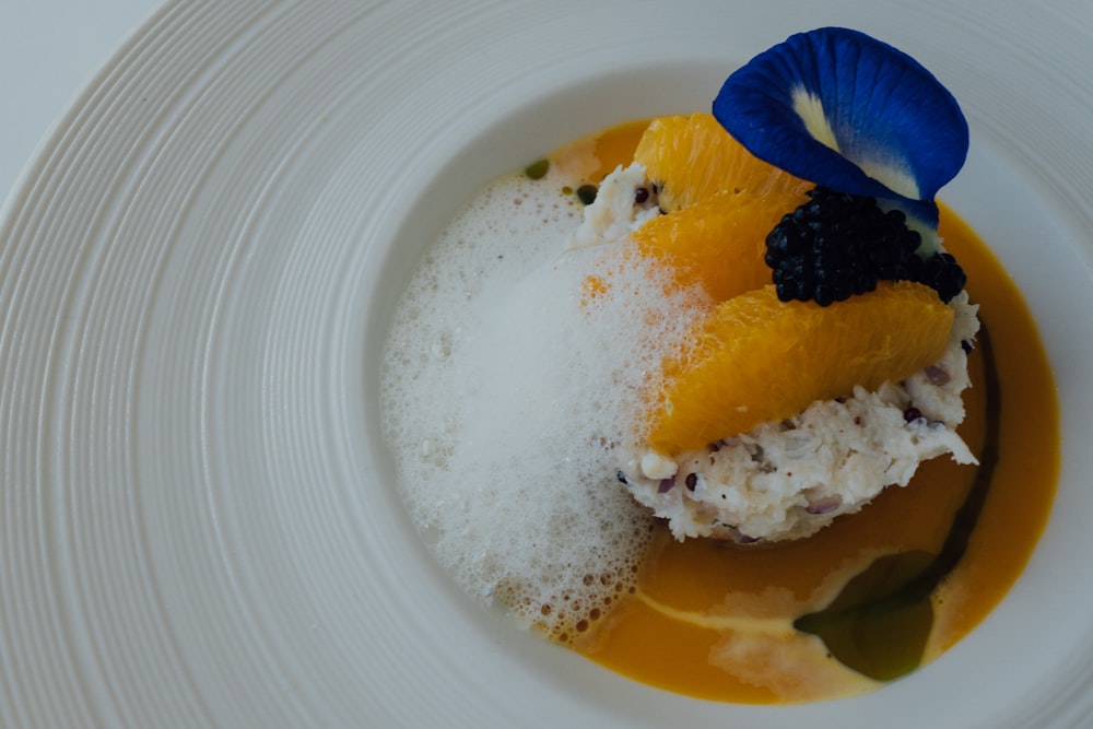 sliced of yellow cake on white ceramic plate