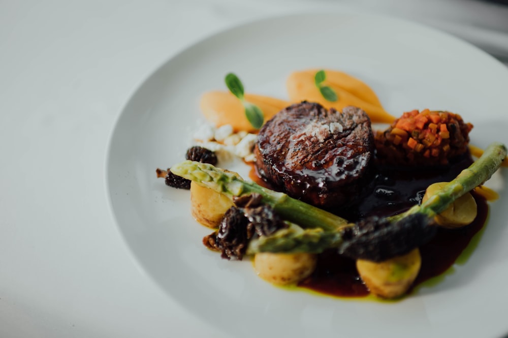 cooked food on white ceramic plate