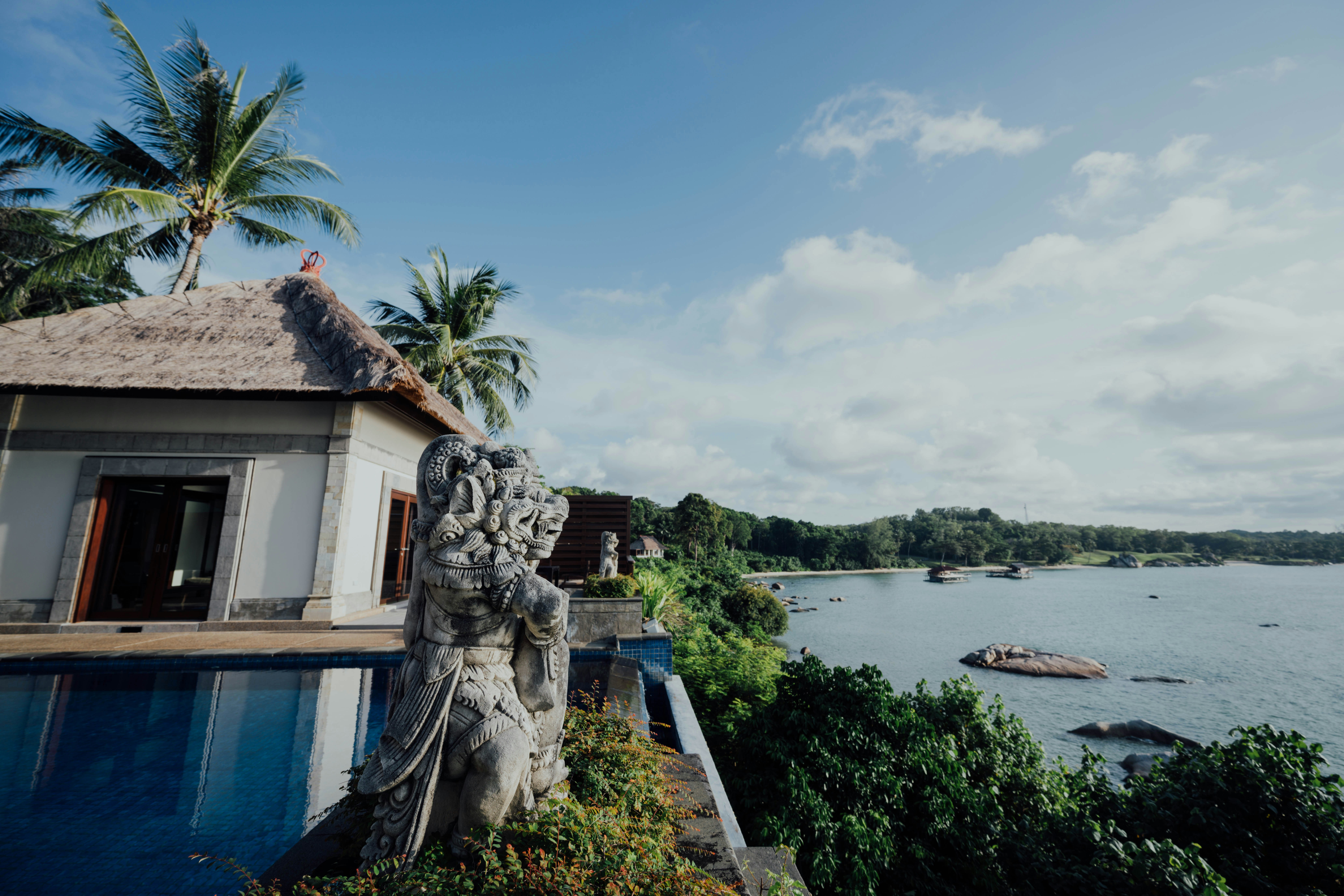 White and brown house near body of water during daytime photo – Free ...
