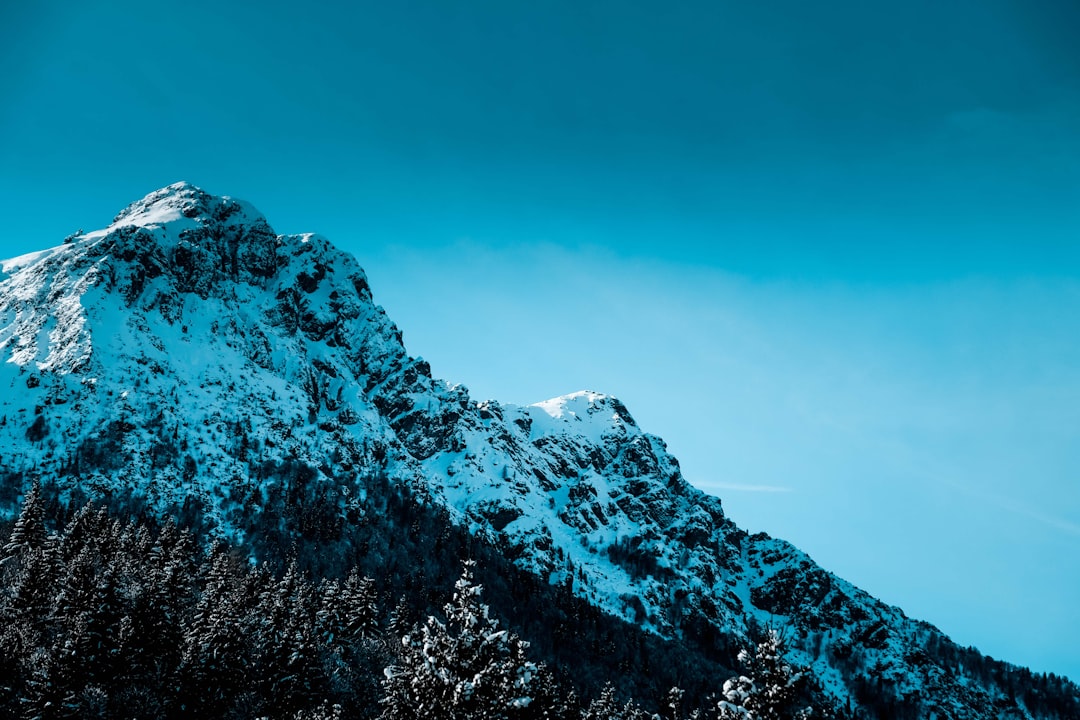 snow covered mountain under blue sky during daytime