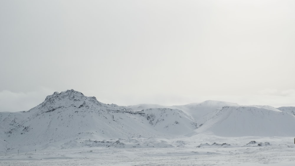 snow covered mountain during daytime