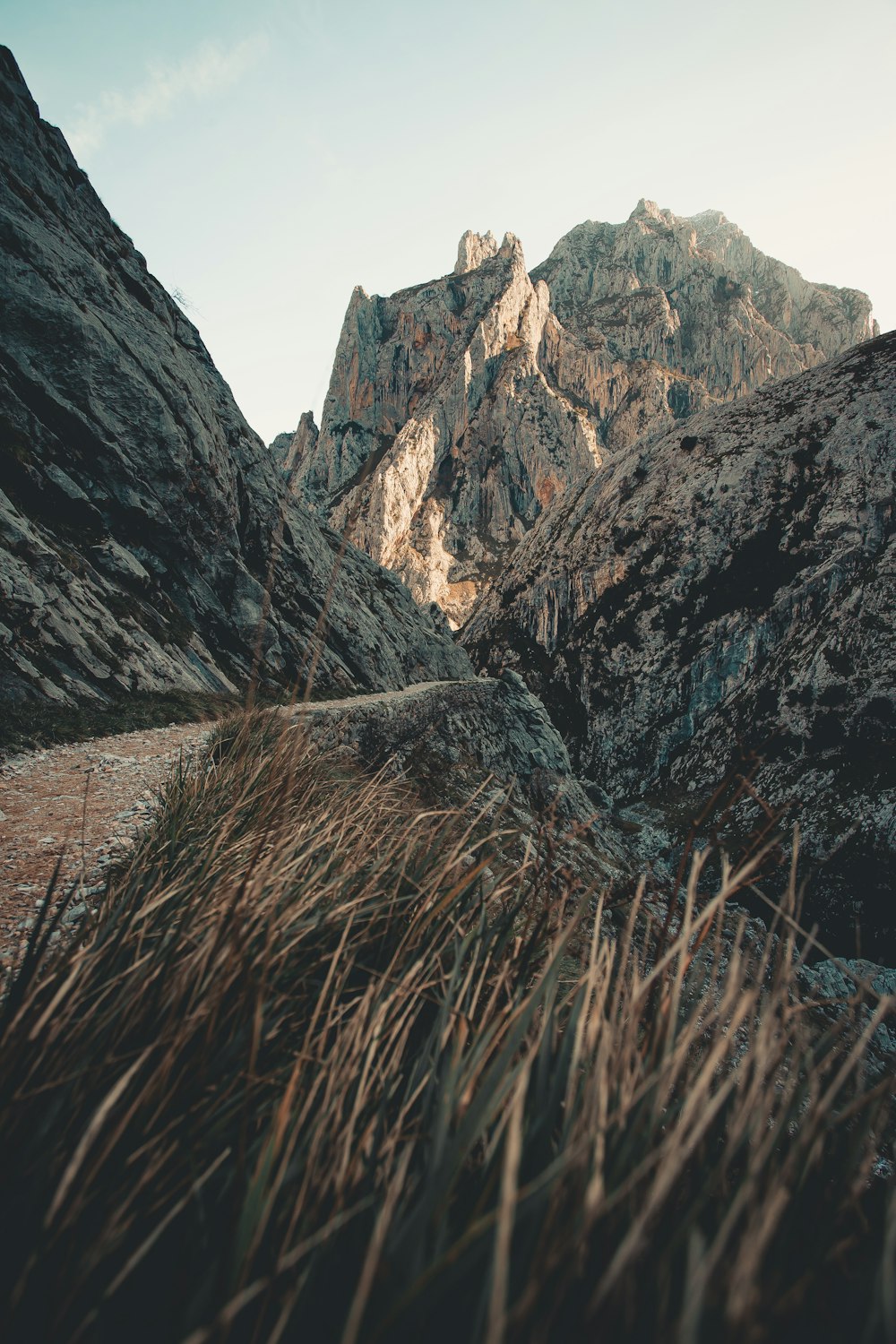 gray rocky mountain under white sky during daytime