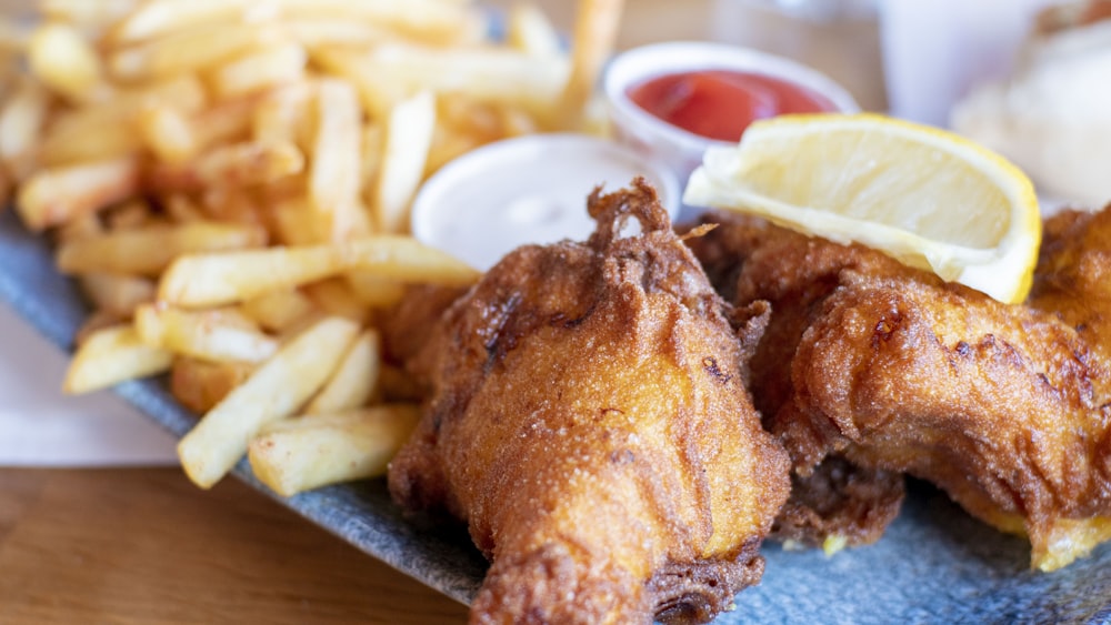 fried chicken with fries and sauce