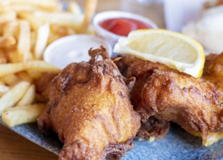 fried chicken with fries and sauce