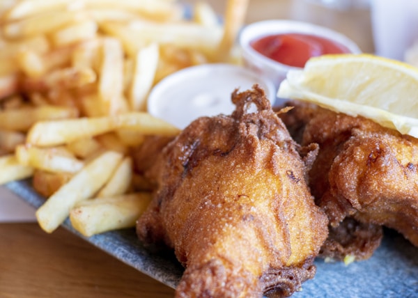 fried chicken with fries and sauce