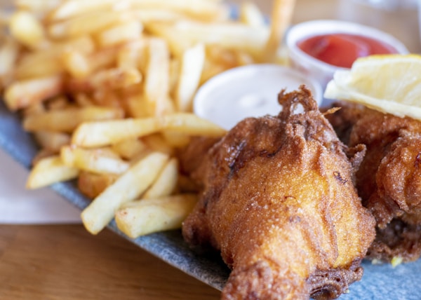 fried chicken with fries and sauce