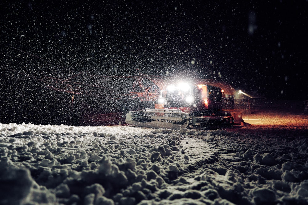 white car on road during night time