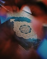 blue and white floral textile