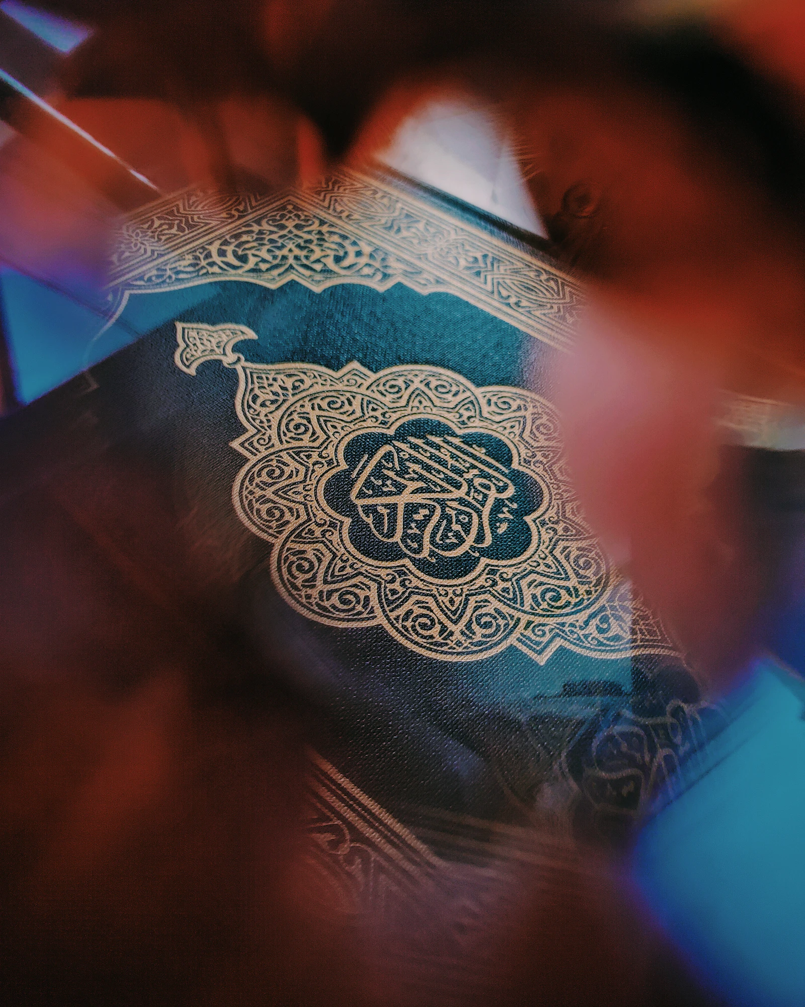 An open Quran with intricate calligraphy