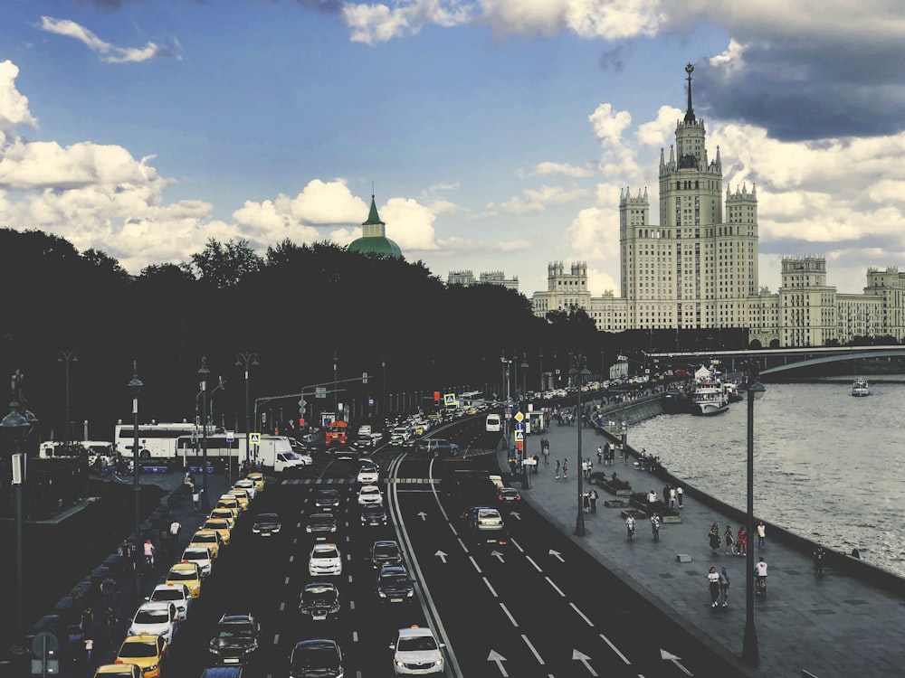 cars on road near buildings during daytime