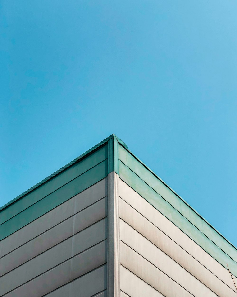 white concrete building under blue sky during daytime