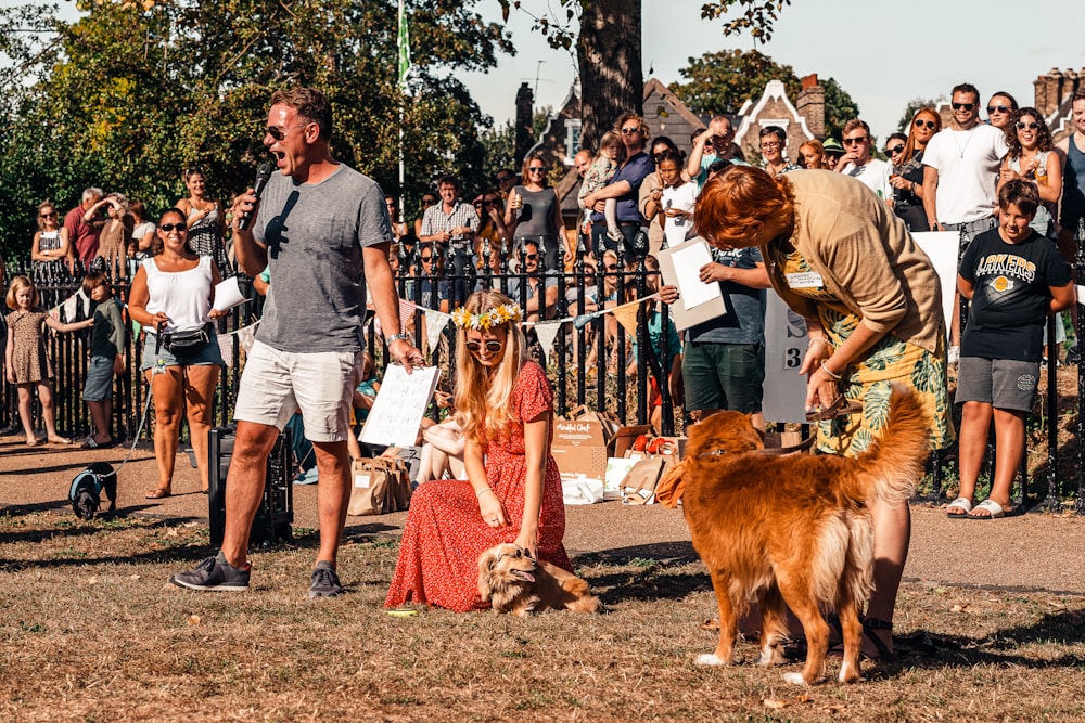 people standing on brown field during daytime