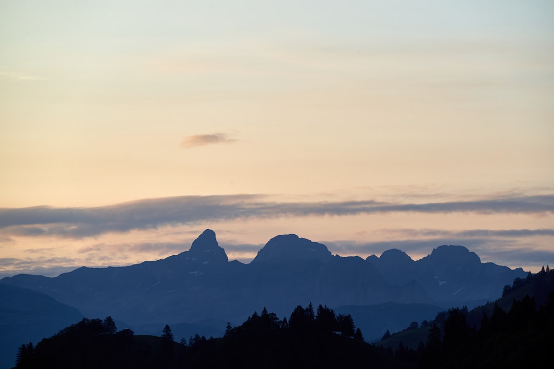 silhouette of mountains during sunset