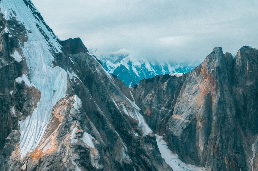 snow covered mountain during daytime