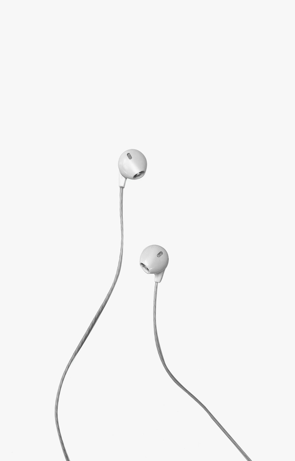 white apple earpods on white background