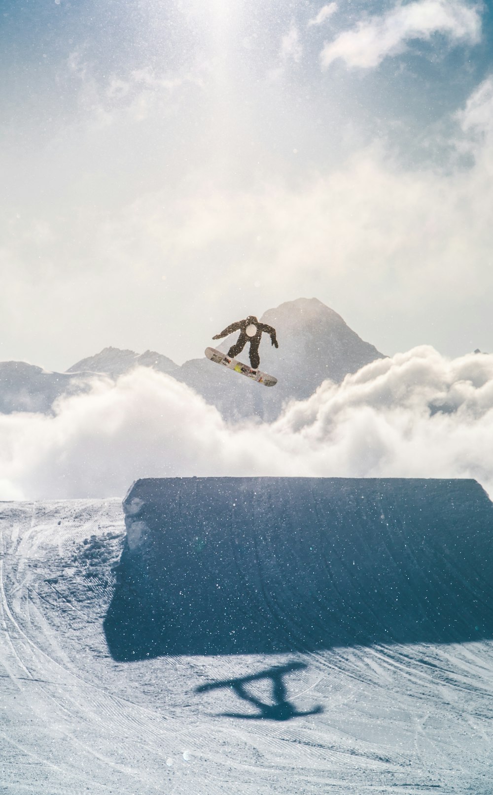 person in black wetsuit surfing on blue ocean water during daytime