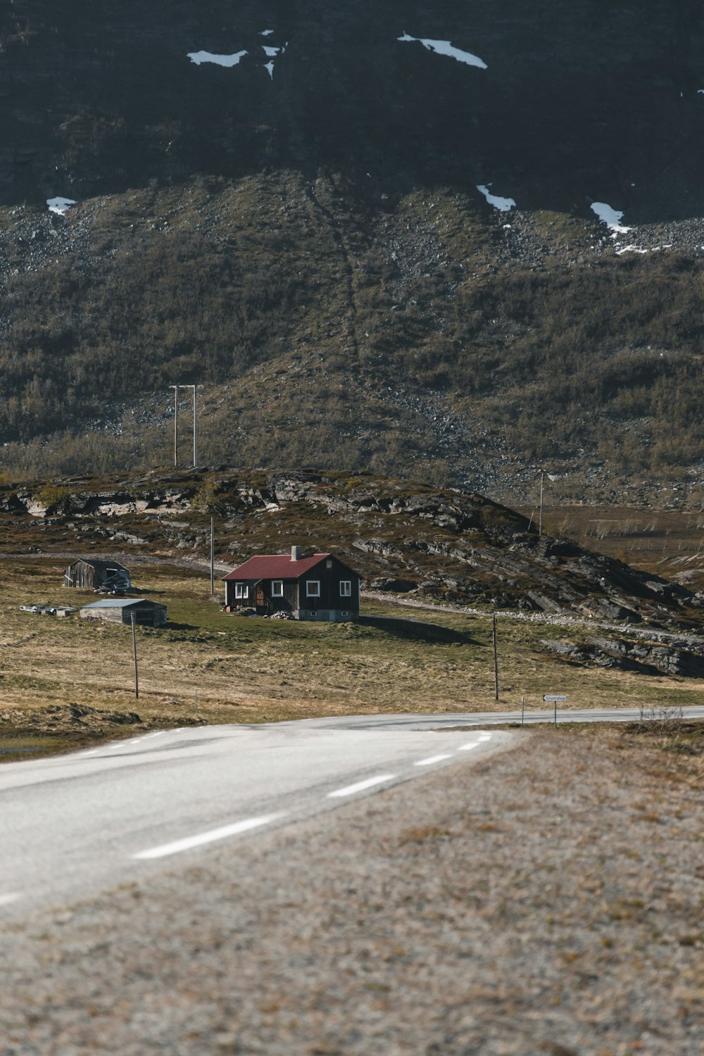 red and brown house near road