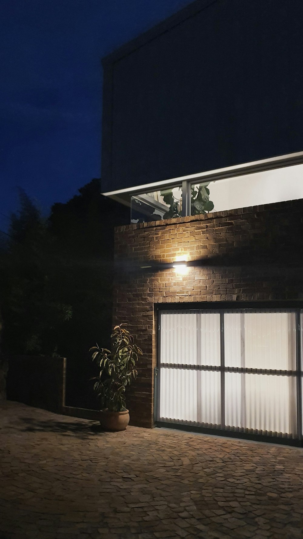 white and brown wooden house during night time