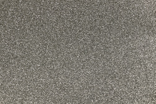 Close-up image of a zinc oxide thin film under a microscope revealing its textured surface.