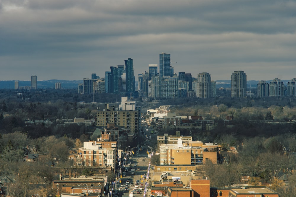 city buildings under blue sky during daytime