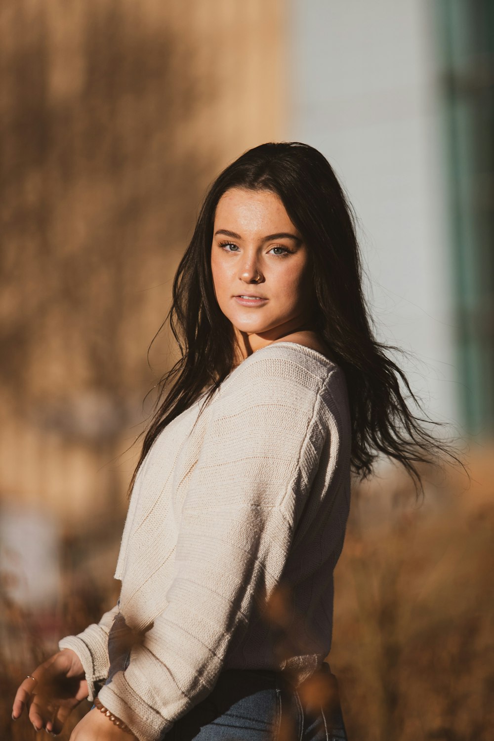 woman in white long sleeve shirt