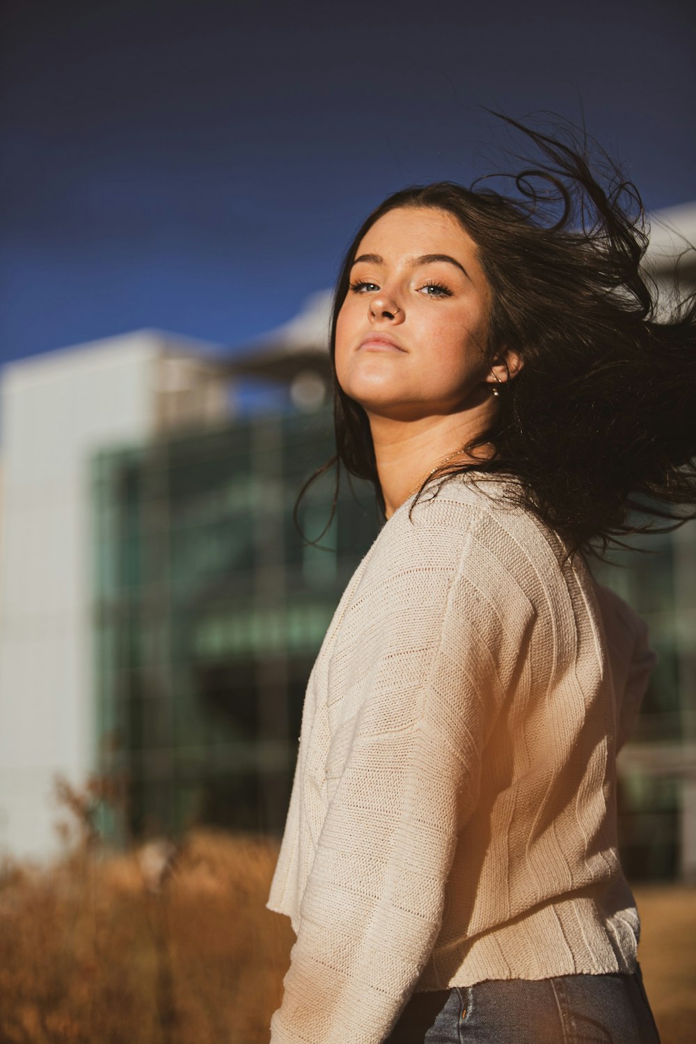 woman in white knit cardigan