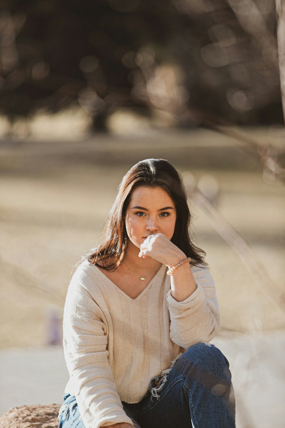 woman in white long sleeve shirt