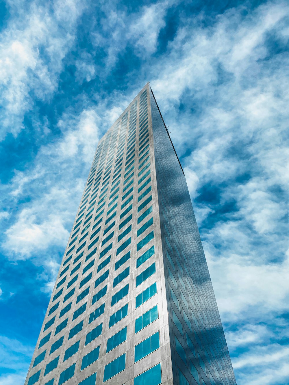 gray concrete building under blue sky