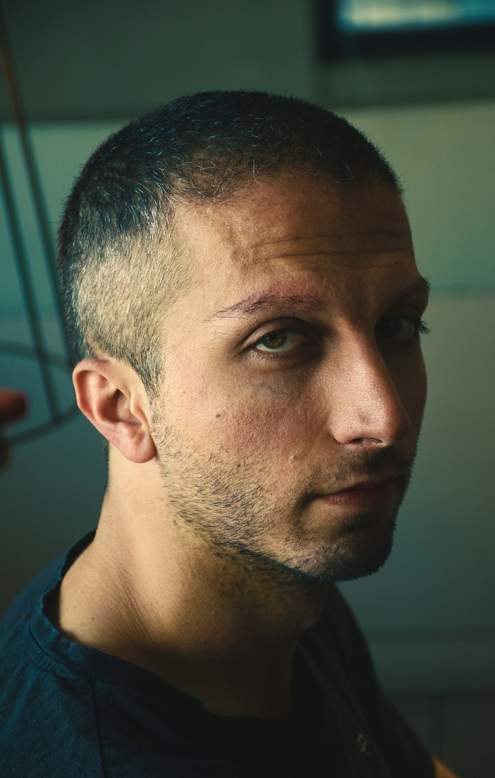 man in blue collared shirt