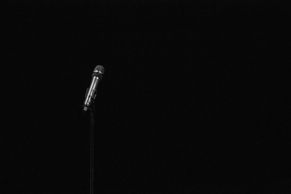 black and silver microphone with stand