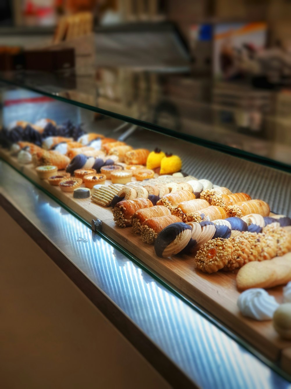 brown and white bread on display counter