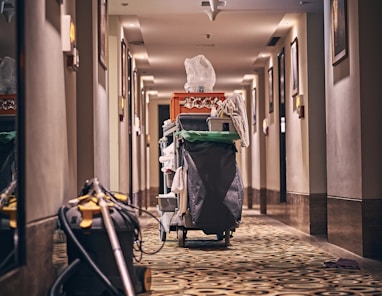 black and gray stroller on hallway