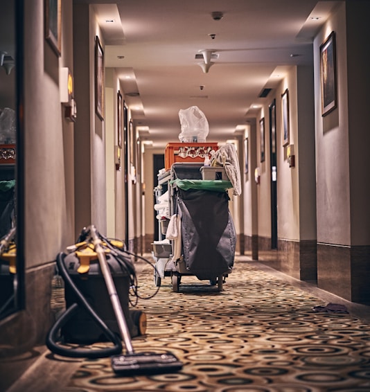 black and gray stroller on hallway