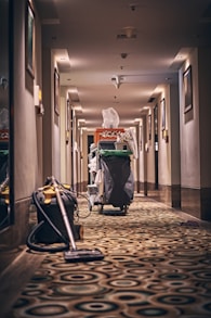 black and gray stroller on hallway