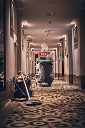 black and gray stroller on hallway