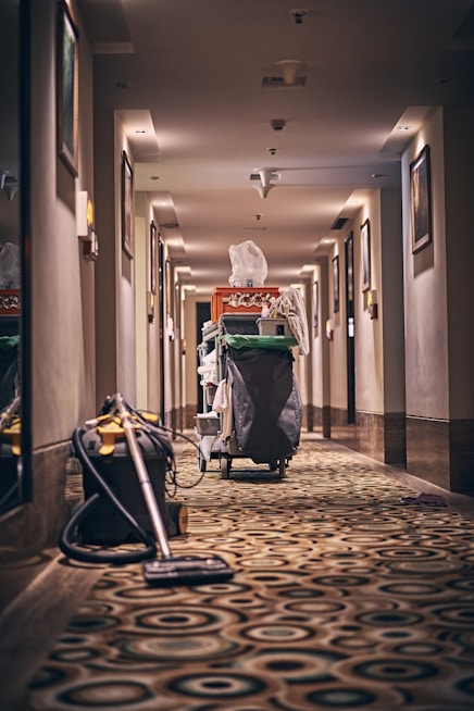black and gray stroller on hallway