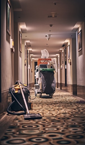 black and gray stroller on hallway