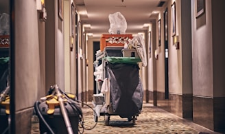 black and gray stroller on hallway