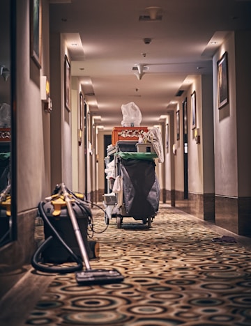 black and gray stroller on hallway