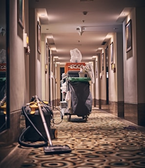 black and gray stroller on hallway