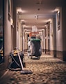 black and gray stroller on hallway