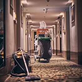 black and gray stroller on hallway