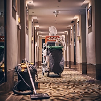 black and gray stroller on hallway